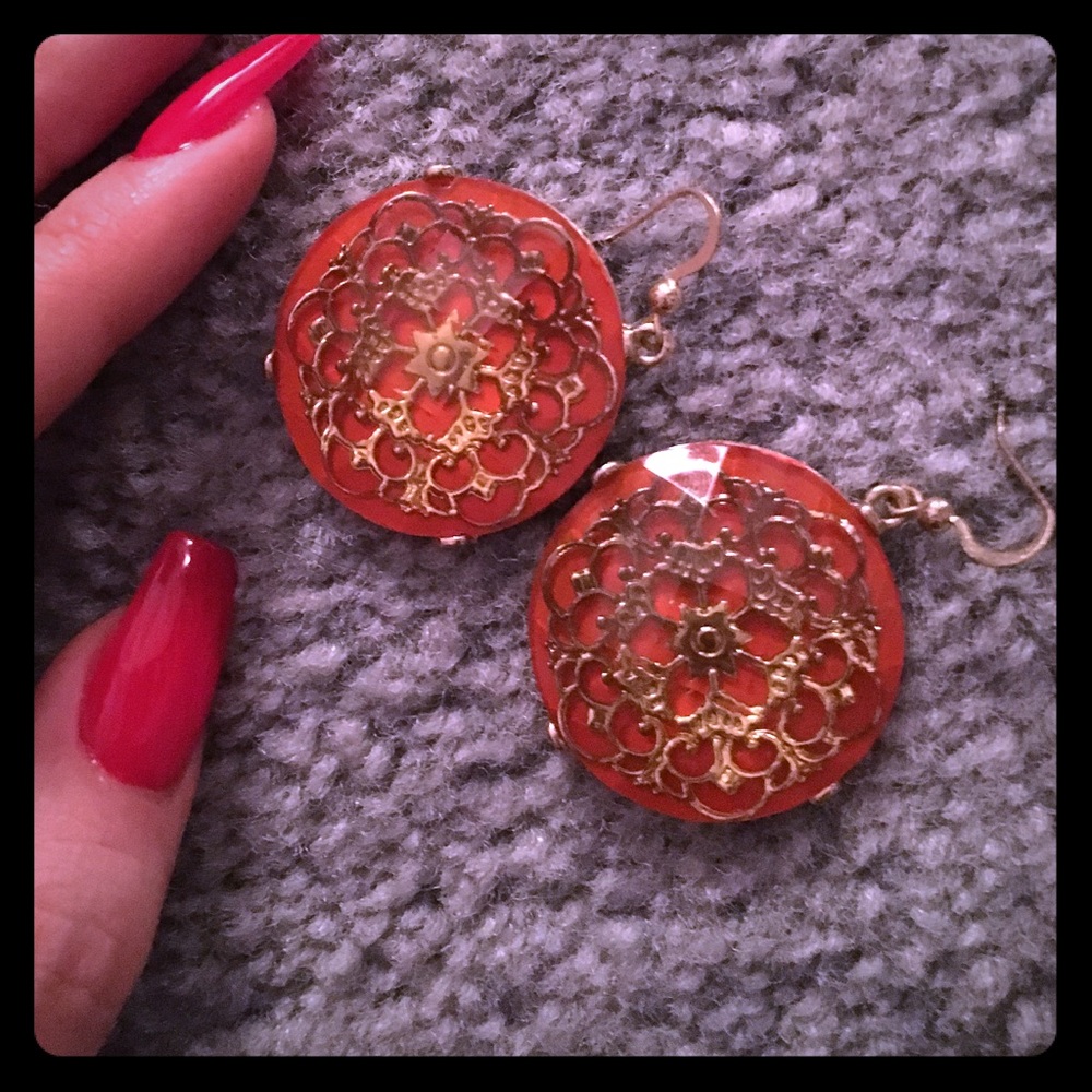 Orangy/red earring